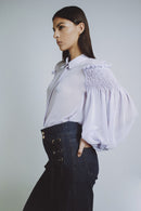 BLUSA CON ARRICCIO